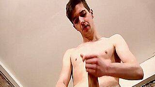 Fit young Jeremy Chris has cum stroking uncut cock solo - gayxo.com